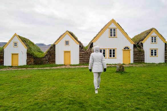 Iceland_woman-walking-towards-facades-of-the-glaumbaer-thr perfect for introverting